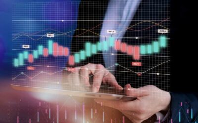 Trader analysant graphiques financiers et signaux d'achat/vente pour le trading du blé sur interface numérique